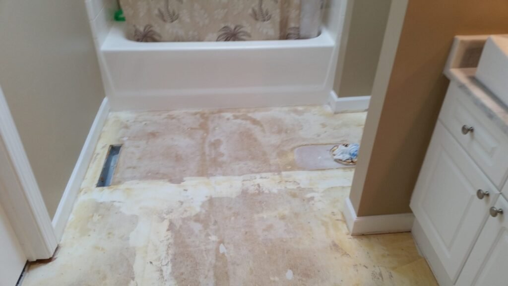 Bathroom floor stripped before new tile