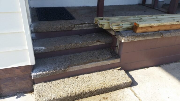 Worn concrete front steps before tiling