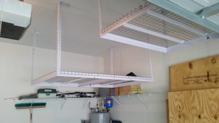 Overhead storage rack installed on a garage ceiling