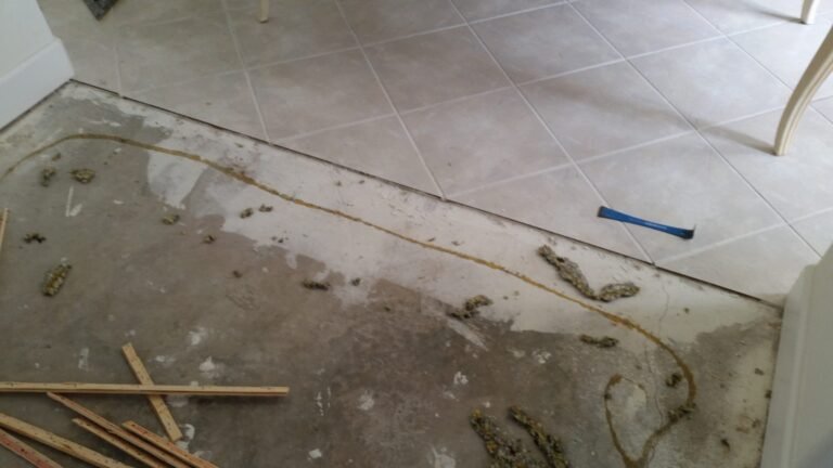 Living room stripped to the concrete slab before new flooring