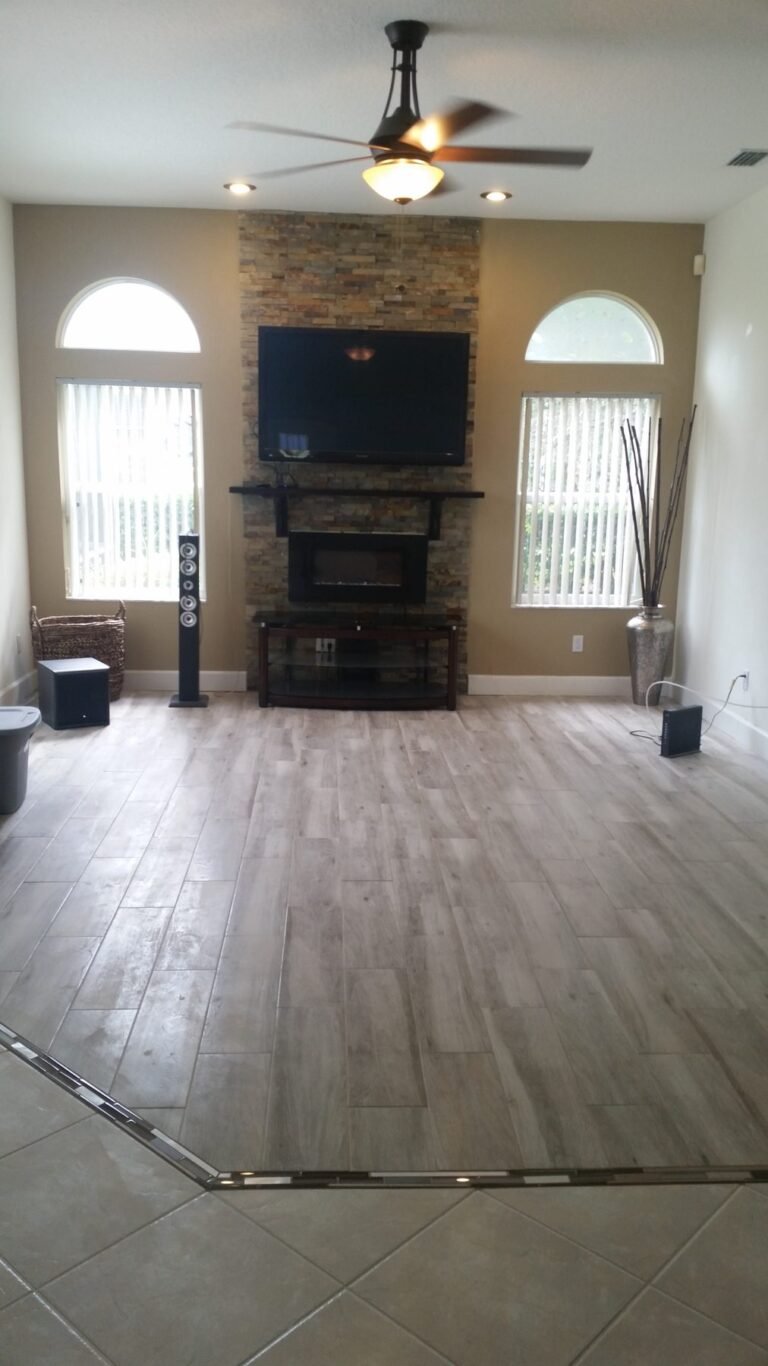 Finished wood-look tile floor in a bright living room